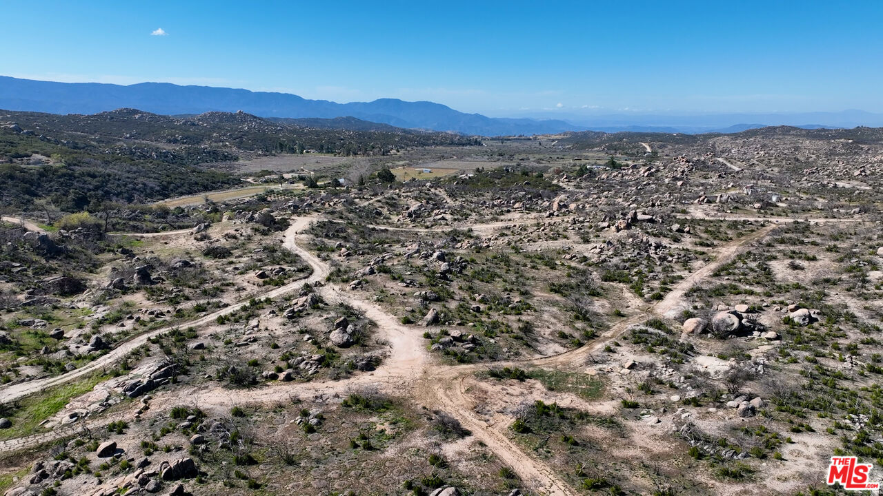 51919 Tule Peak Road Aguanga, CA 92536 - Photo 23 of 44 a view of a city with mountains in the background