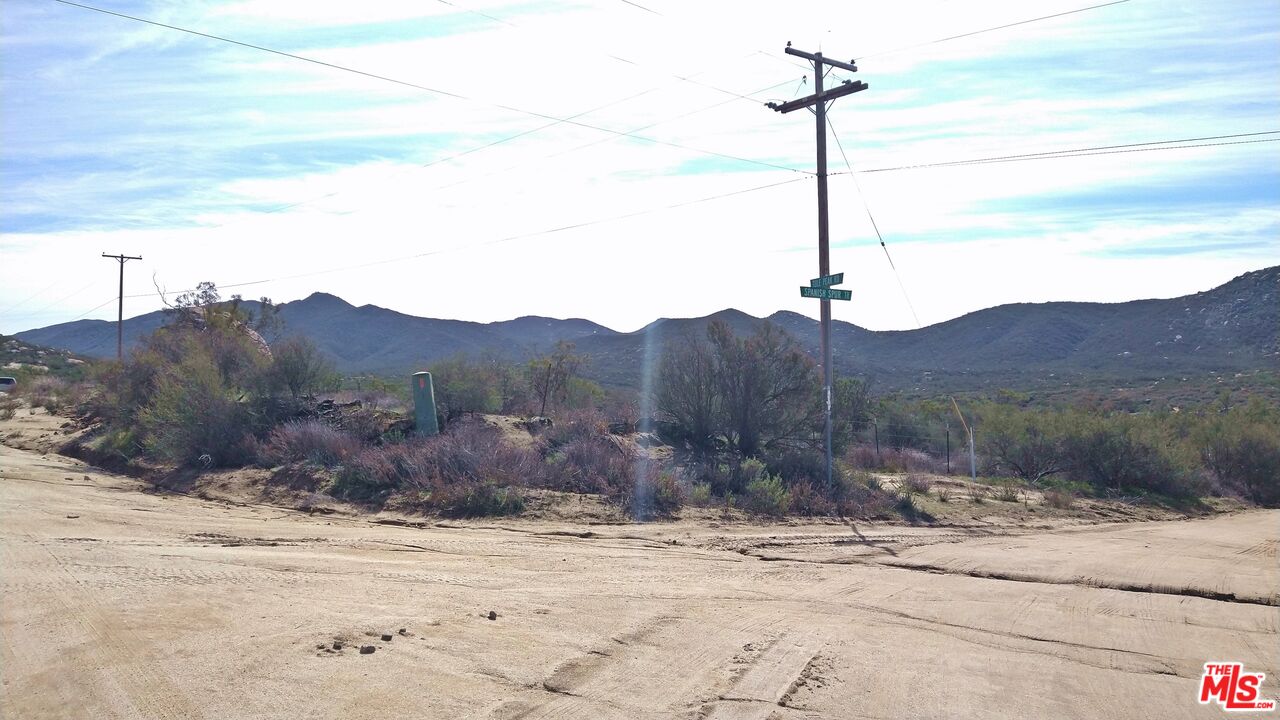 51919 Tule Peak Road Aguanga, CA 92536 - Photo 33 of 44 a view of a dry yard with wooden fence