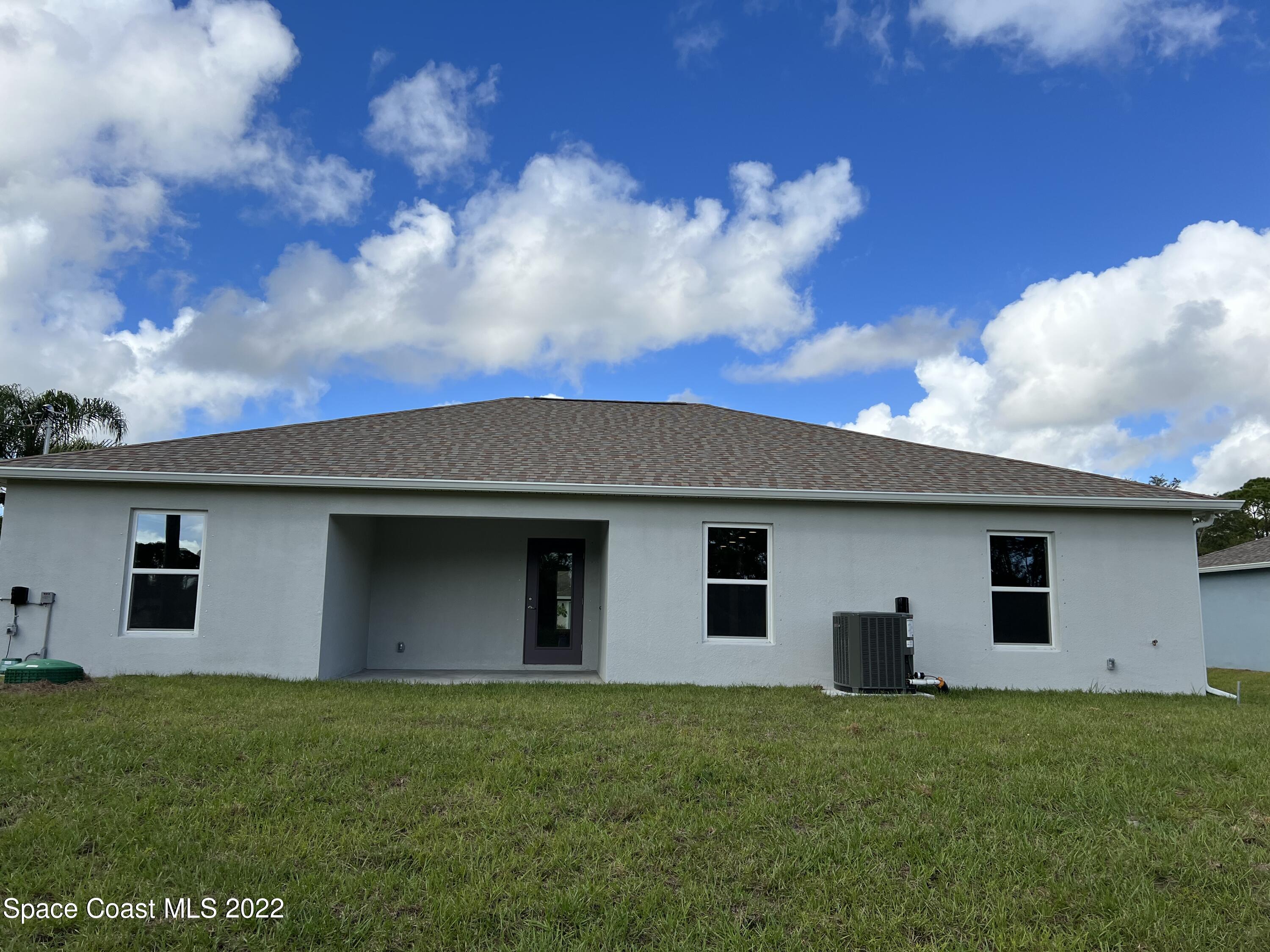 1360 Danforth Street Southwest Palm Bay, FL 32908 - Photo 2 of 9 072CD0CF-F562-406B-8770-54758861B2D4