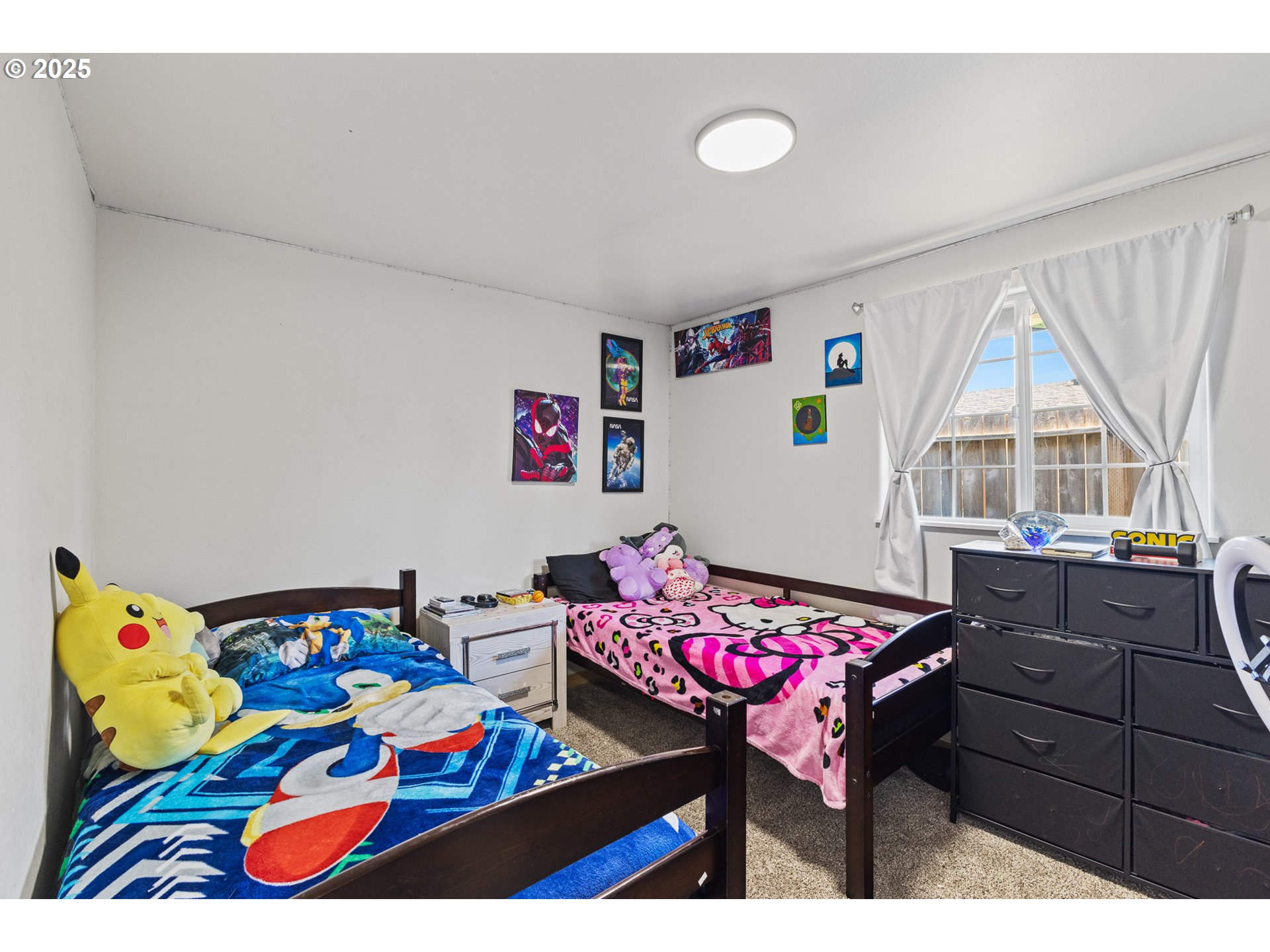 765 State Street North Bend, OR 97459 - Photo 23 of 46 a bedroom with furniture and a window