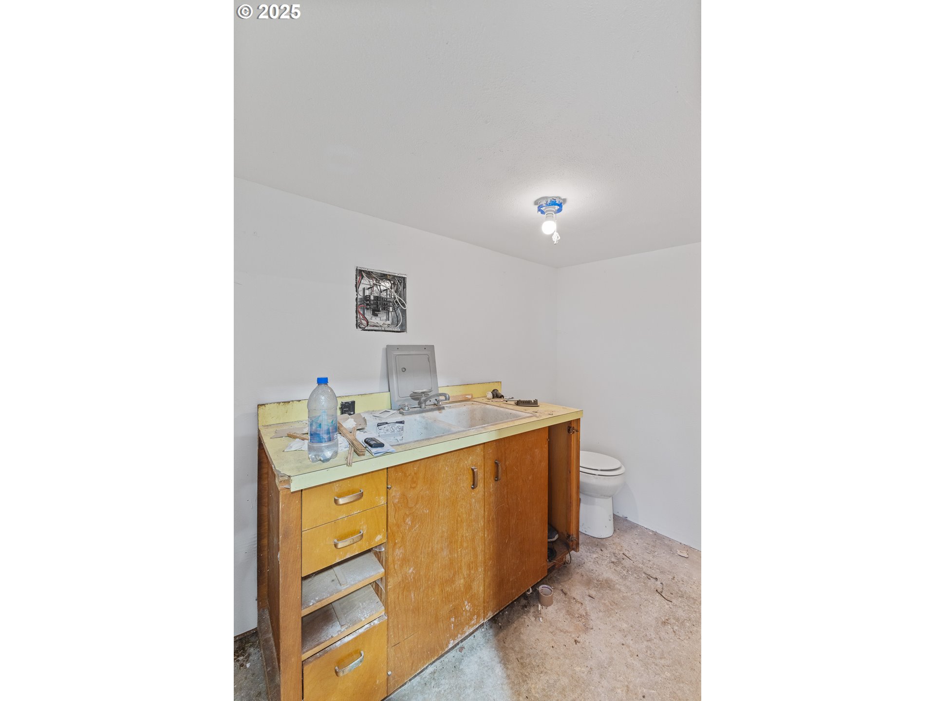 765 State Street North Bend, OR 97459 - Photo 29 of 46 a bathroom with a sink and a mirror