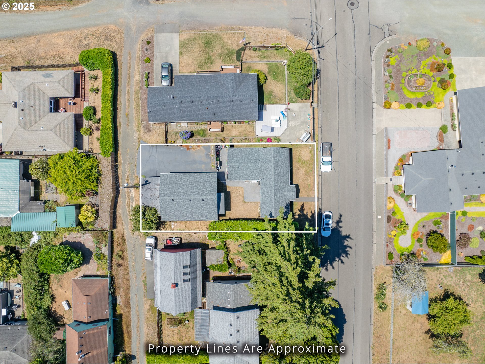 765 State Street North Bend, OR 97459 - Photo 8 of 46 an aerial view of residential houses with outdoor space