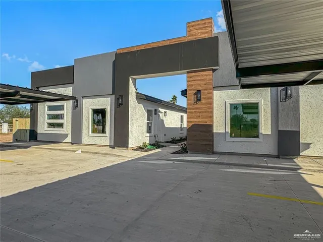 a view of a house with a patio