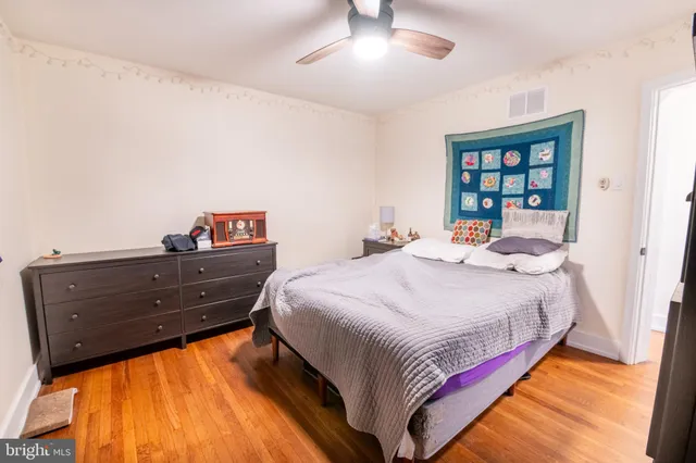 a bed room with a bed and a window