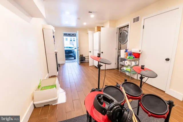 a room with furniture and a wooden floor