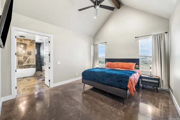 a bedroom with a bed and a walk in closet