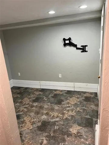 a view of a room with an empty space