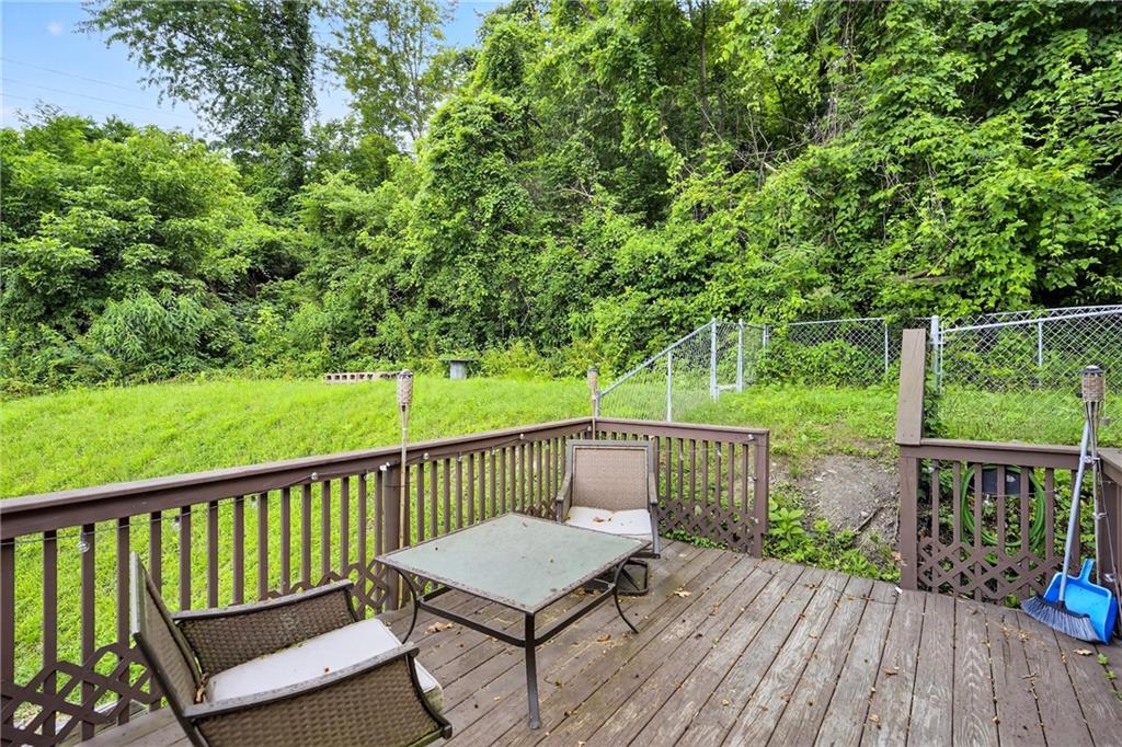 2 Mallard Street Allenport, PA 15412 - Photo 2 of 25 a view of a wooden deck with a yard