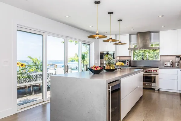 a kitchen with a sink and cabinets
