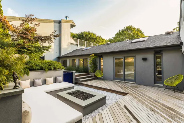 a view of a chairs and table in a patio