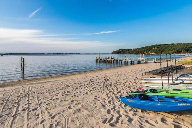 a view of swimming pool with outdoor seating