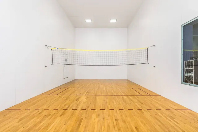 a view of a terrace with wooden floor and lake view