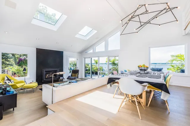 a view of entryway and hall with dining area