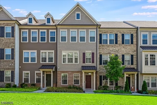 front view of a building with a yard