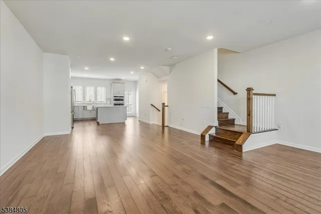 a view of livingroom with furniture and wooden floor