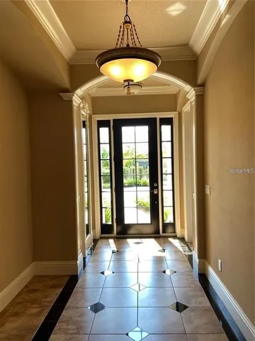 a kitchen with stainless steel appliances granite countertop a stove and a refrigerator