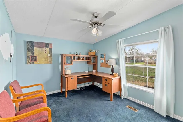 a room with furniture and a window