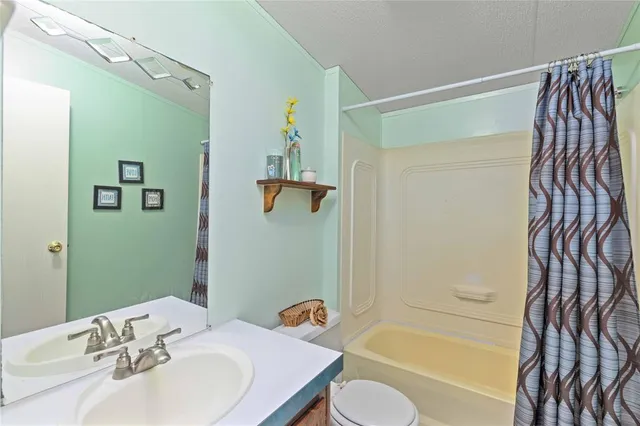 a bathroom with a sink and a bathtub