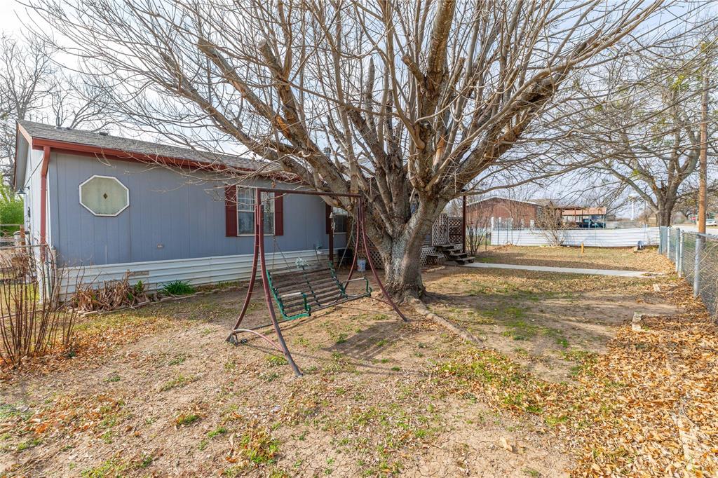 209 Martin Street Bangs, TX 76823 - Photo 28 of 31 large beautiful tree in the front yard