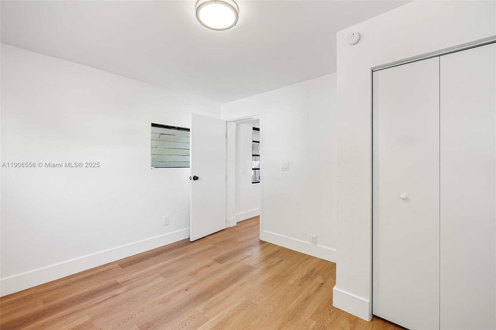 Grapeland Heights Estates Miami, FL 33125 - Photo 20 of 26 a view of a livingroom with wooden floor