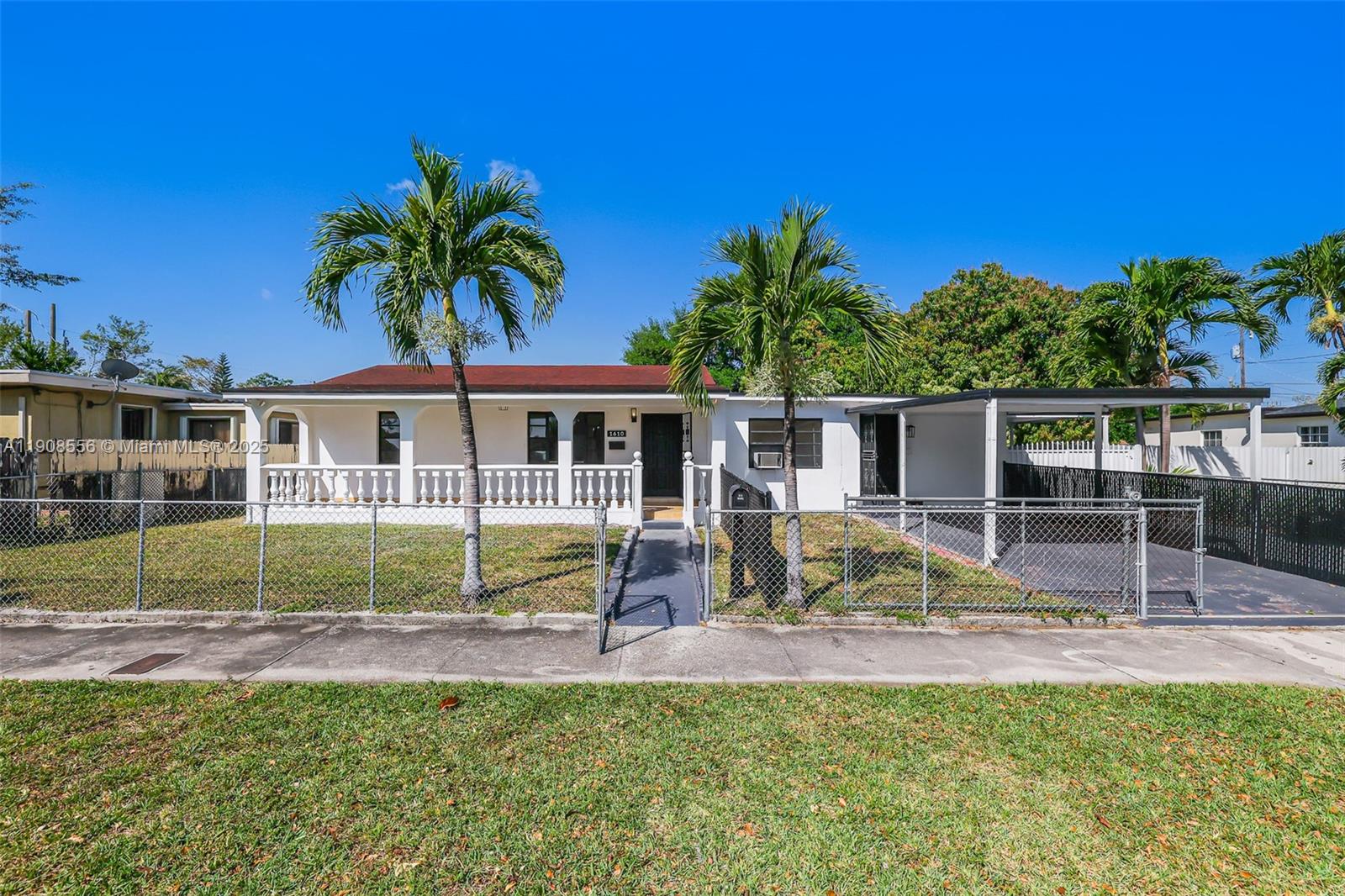 Grapeland Heights Estates Miami, FL 33125 - Photo 2 of 26 a view of house with backyard and swimming pool