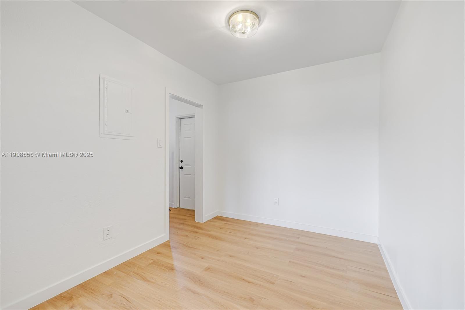 Grapeland Heights Estates Miami, FL 33125 - Photo 25 of 26 a view of an empty room