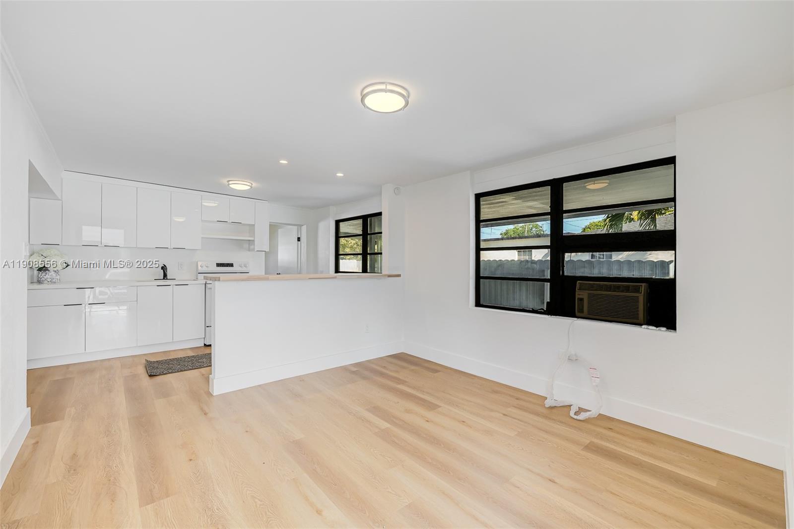 Grapeland Heights Estates Miami, FL 33125 - Photo 3 of 26 a view of a kitchen with a sink and a window