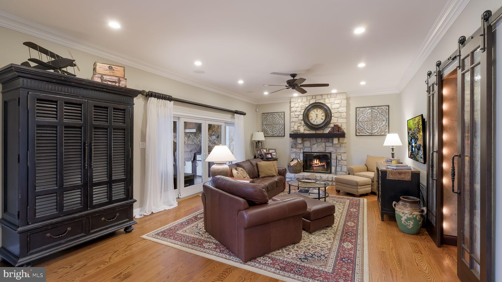 33 Bittersweet Drive Doylestown, PA 18901 - Photo 21 of 71 a living room with furniture and a fireplace
