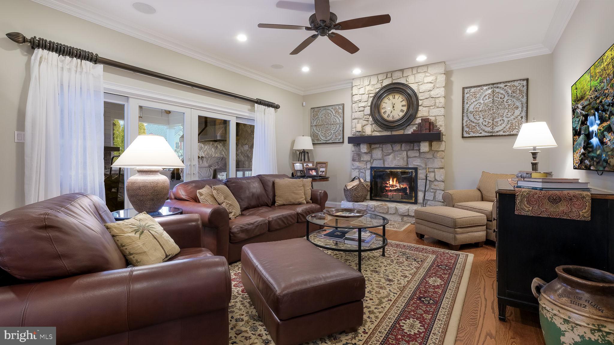 33 Bittersweet Drive Doylestown, PA 18901 - Photo 25 of 71 a living room with furniture a fireplace and a window