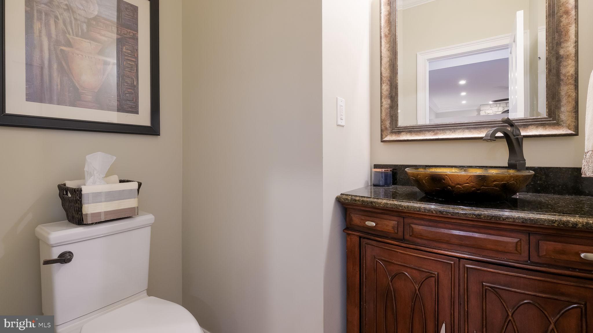 33 Bittersweet Drive Doylestown, PA 18901 - Photo 26 of 71 a bathroom with a toilet a sink and mirror