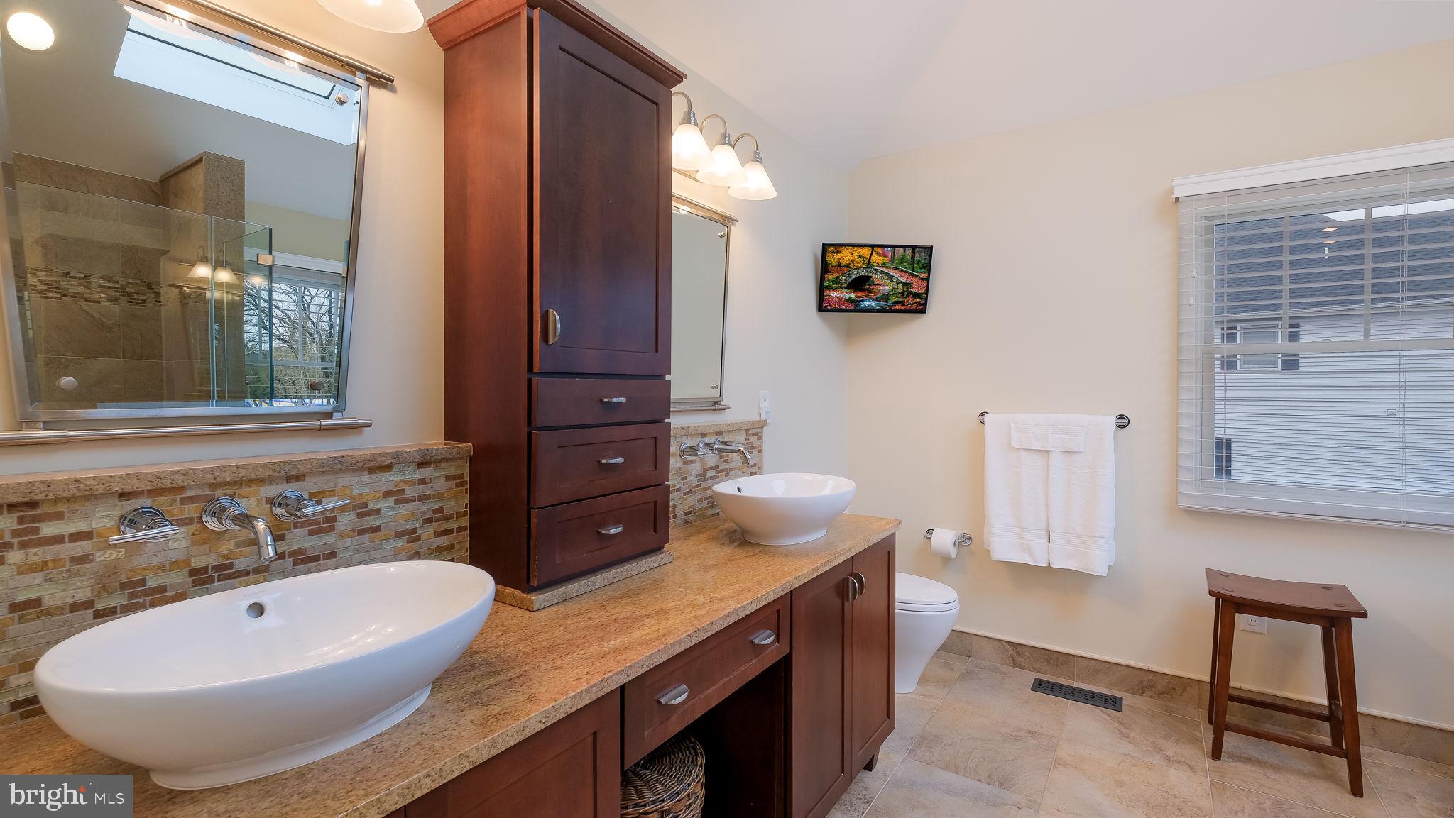 33 Bittersweet Drive Doylestown, PA 18901 - Photo 35 of 71 a bathroom with a tub sink and mirror