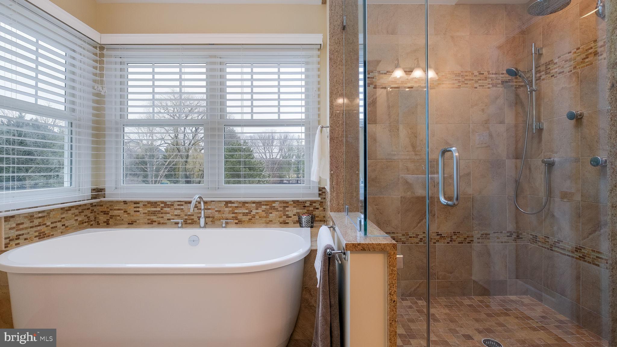 33 Bittersweet Drive Doylestown, PA 18901 - Photo 38 of 71 a white bath tub sitting next to a shower