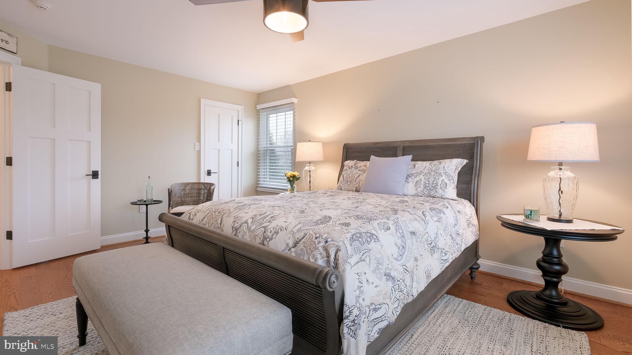 33 Bittersweet Drive Doylestown, PA 18901 - Photo 40 of 71 a bedroom with a bed and a lamp