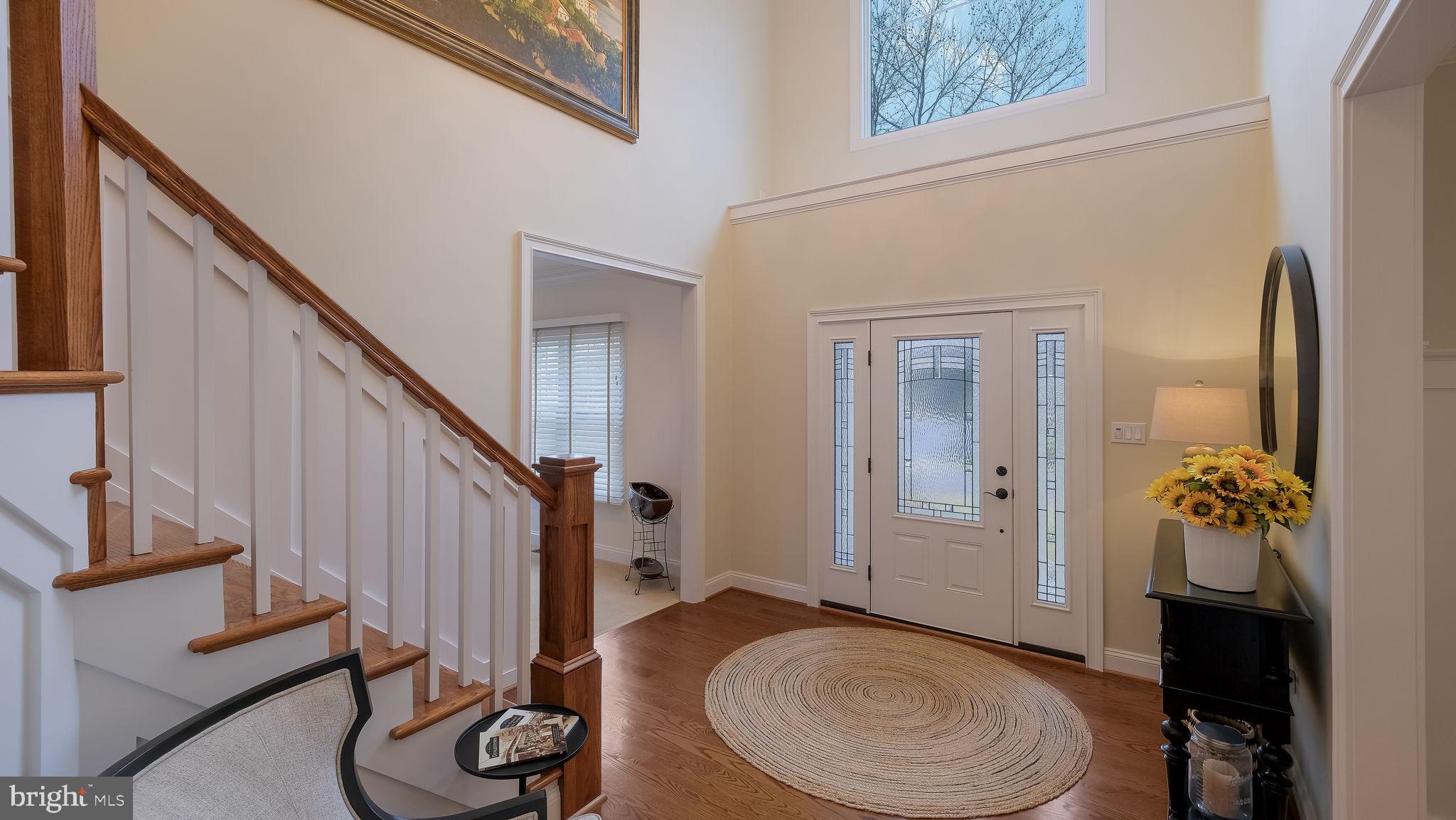 33 Bittersweet Drive Doylestown, PA 18901 - Photo 5 of 71 a view of a hallway with furniture and wooden floor