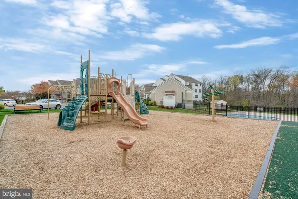 a view of a park with swings