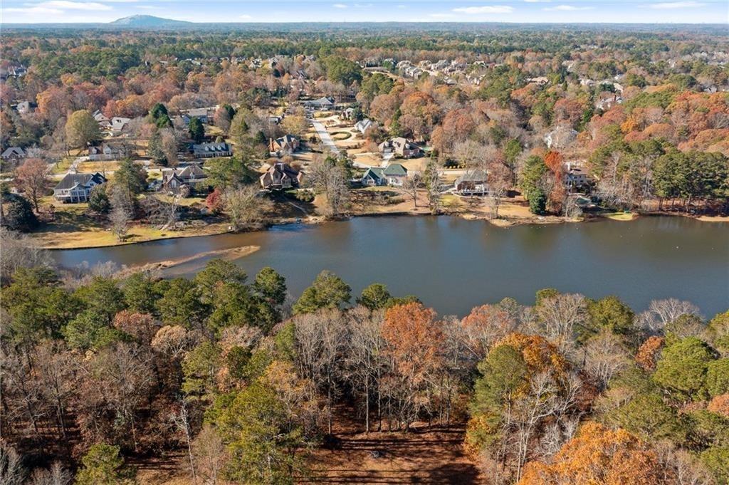 1319 Janmar Road Snellville, GA 30078 - Photo 2 of 38 an aerial view of a houses with ocean view
