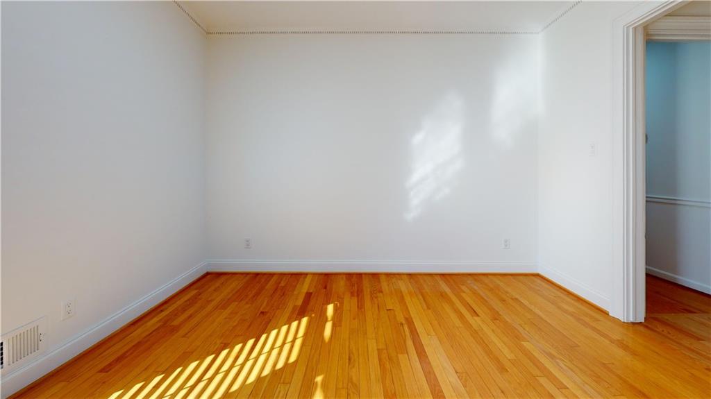 1319 Janmar Road Snellville, GA 30078 - Photo 33 of 38 a view of wooden floor in a room