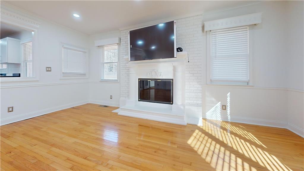 1319 Janmar Road Snellville, GA 30078 - Photo 8 of 38 a view of a livingroom with furniture and fireplace