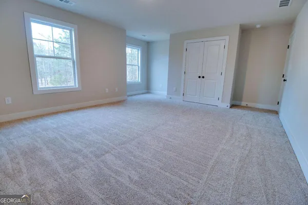 an empty room with windows