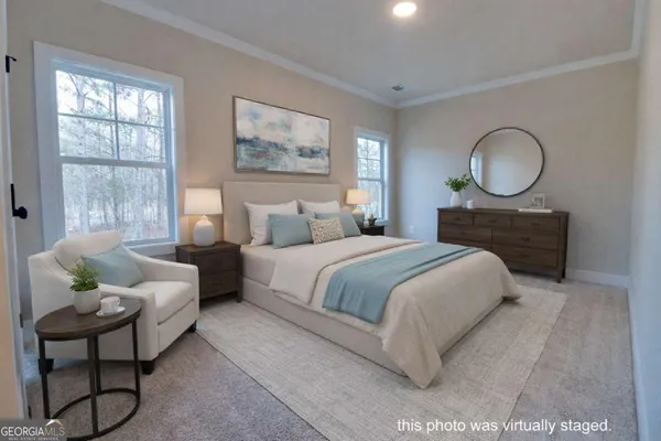 a bedroom with a bed and window