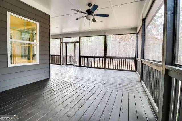 a front view of a house with a lake view