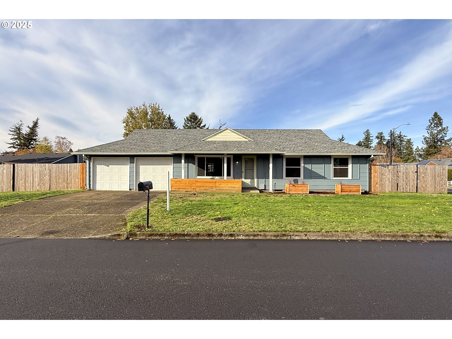 1889 Northeast Beech Avenue Gresham, OR 97030 - Photo 1 of 27 a front view of a house with a yard