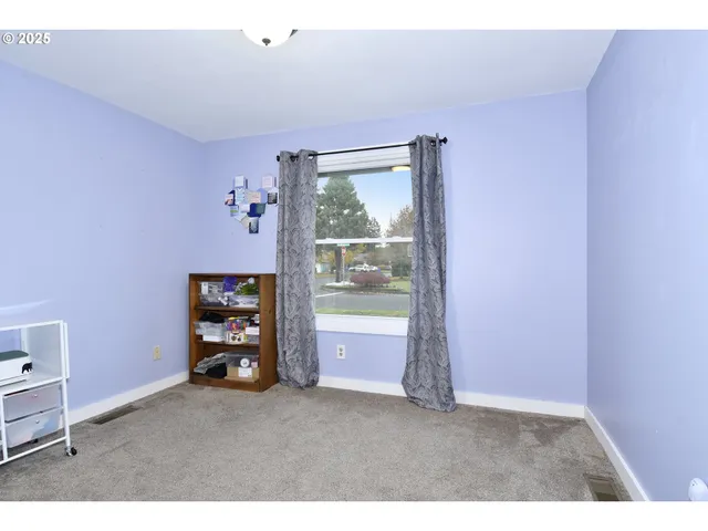 a workspace with furniture and a window