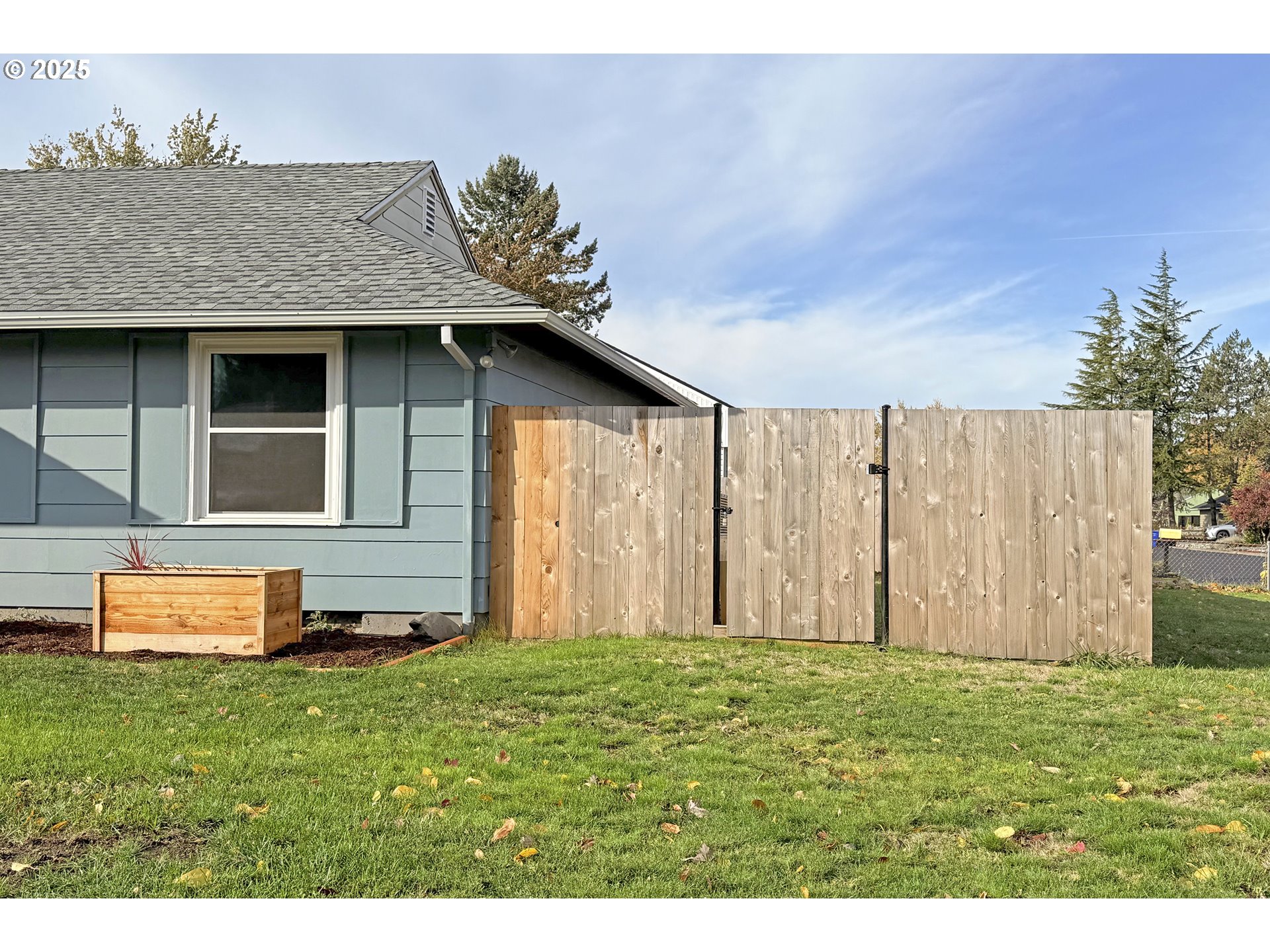 1889 Northeast Beech Avenue Gresham, OR 97030 - Photo 21 of 27 a front view of a house with a garden
