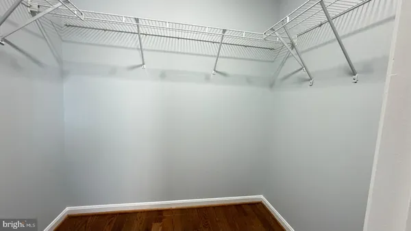 a view of a room with racks on the wall