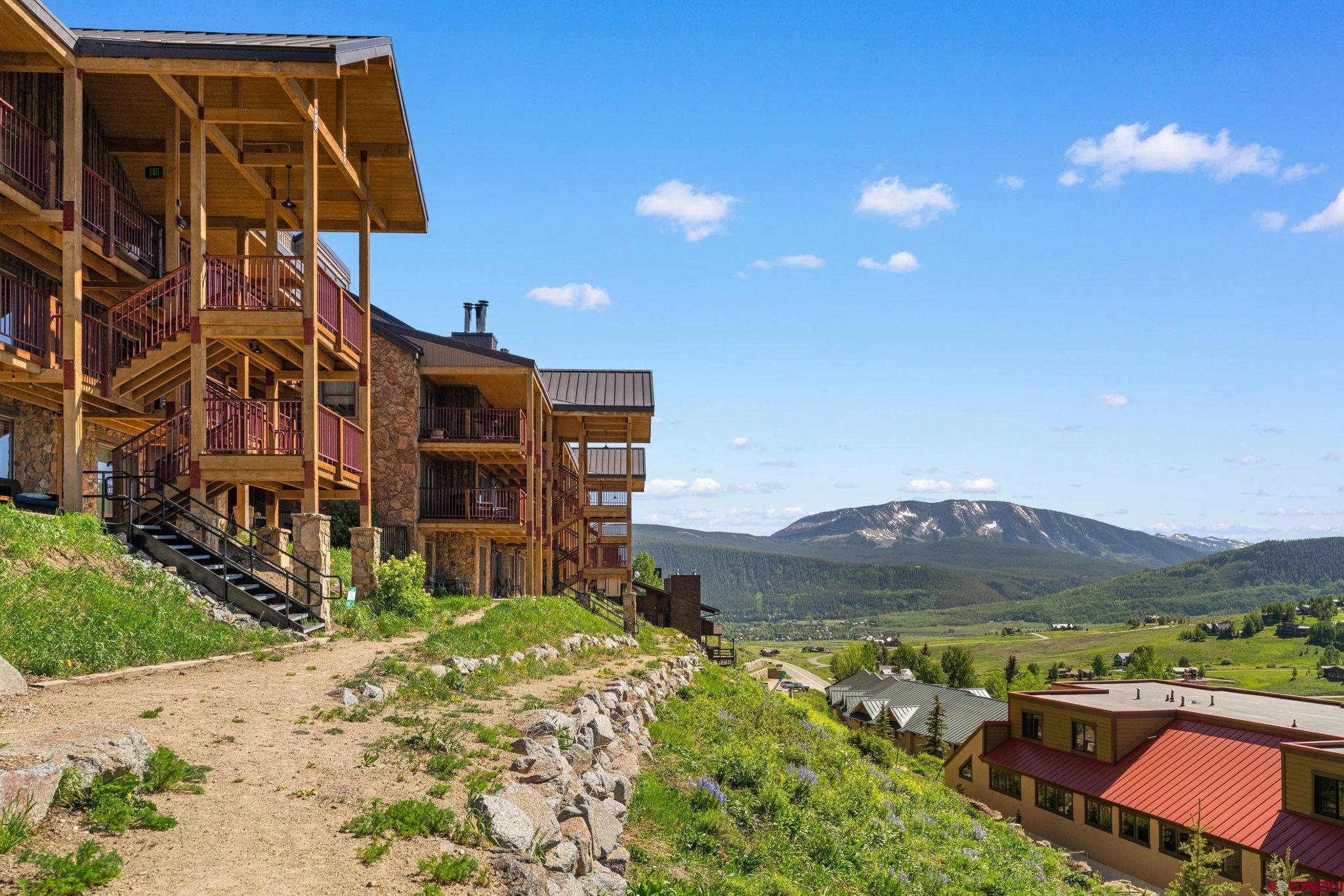 72 Hunter Hill Road, Unit I204 Crested Butte, CO 81225 - Photo 37 of 44 a view of a house with a yard