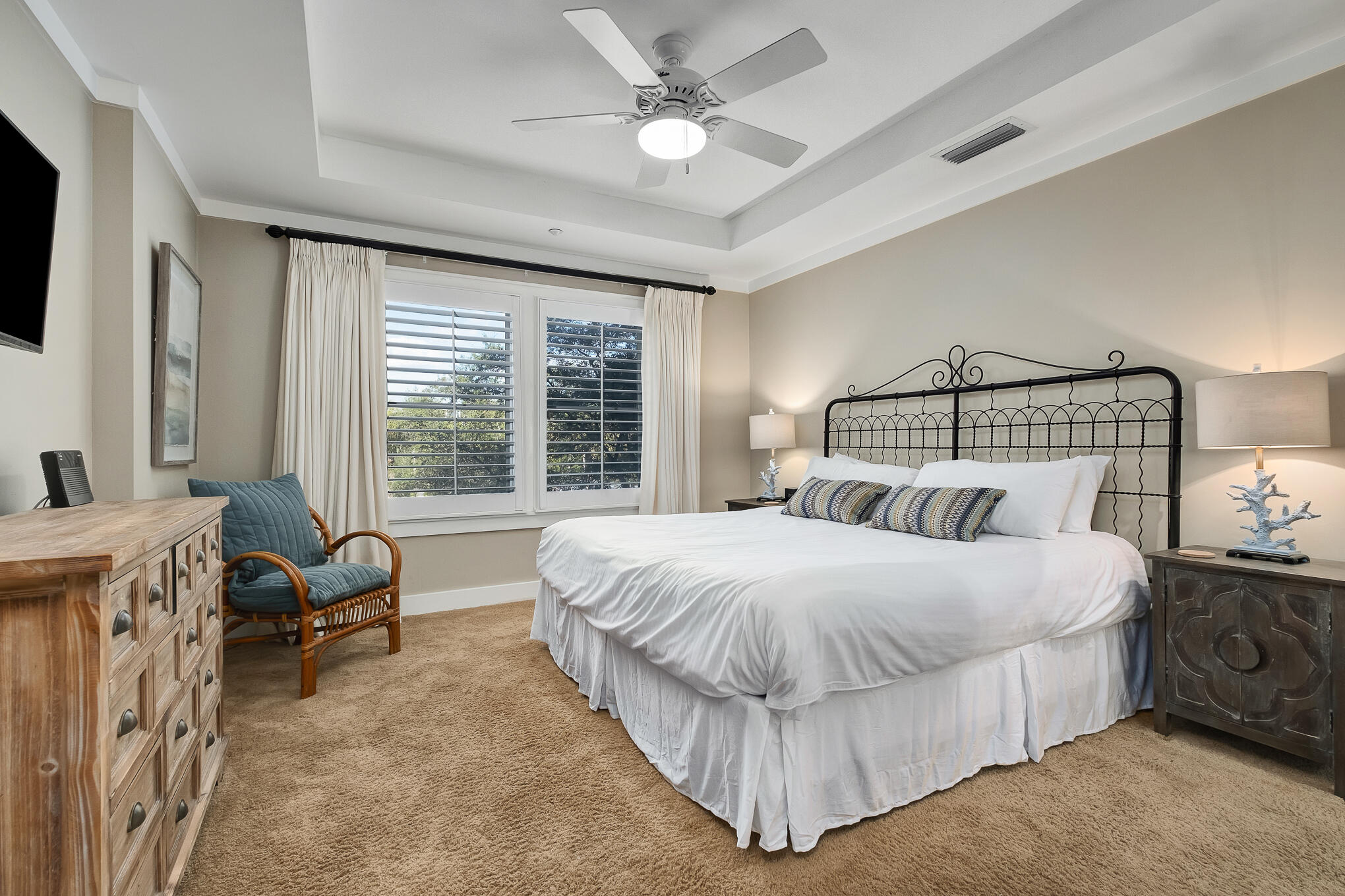 337 Bridge Lane, Unit 103B Inlet Beach, FL 32461 - Photo 12 of 37 a bedroom with a bed couch and a flat tv screen