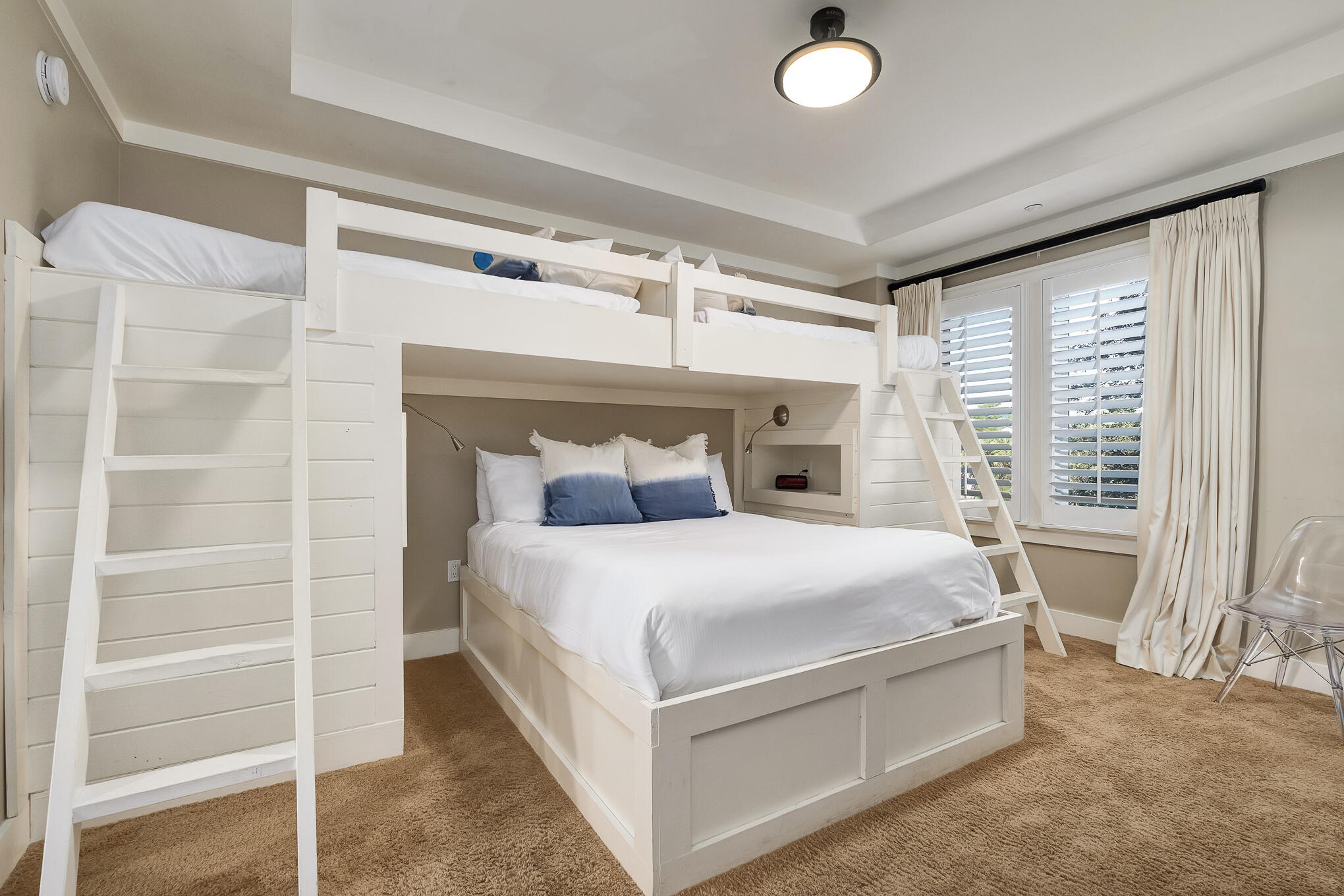 337 Bridge Lane, Unit 103B Inlet Beach, FL 32461 - Photo 14 of 37 a bed sitting in a bedroom next to a window and a larger closet