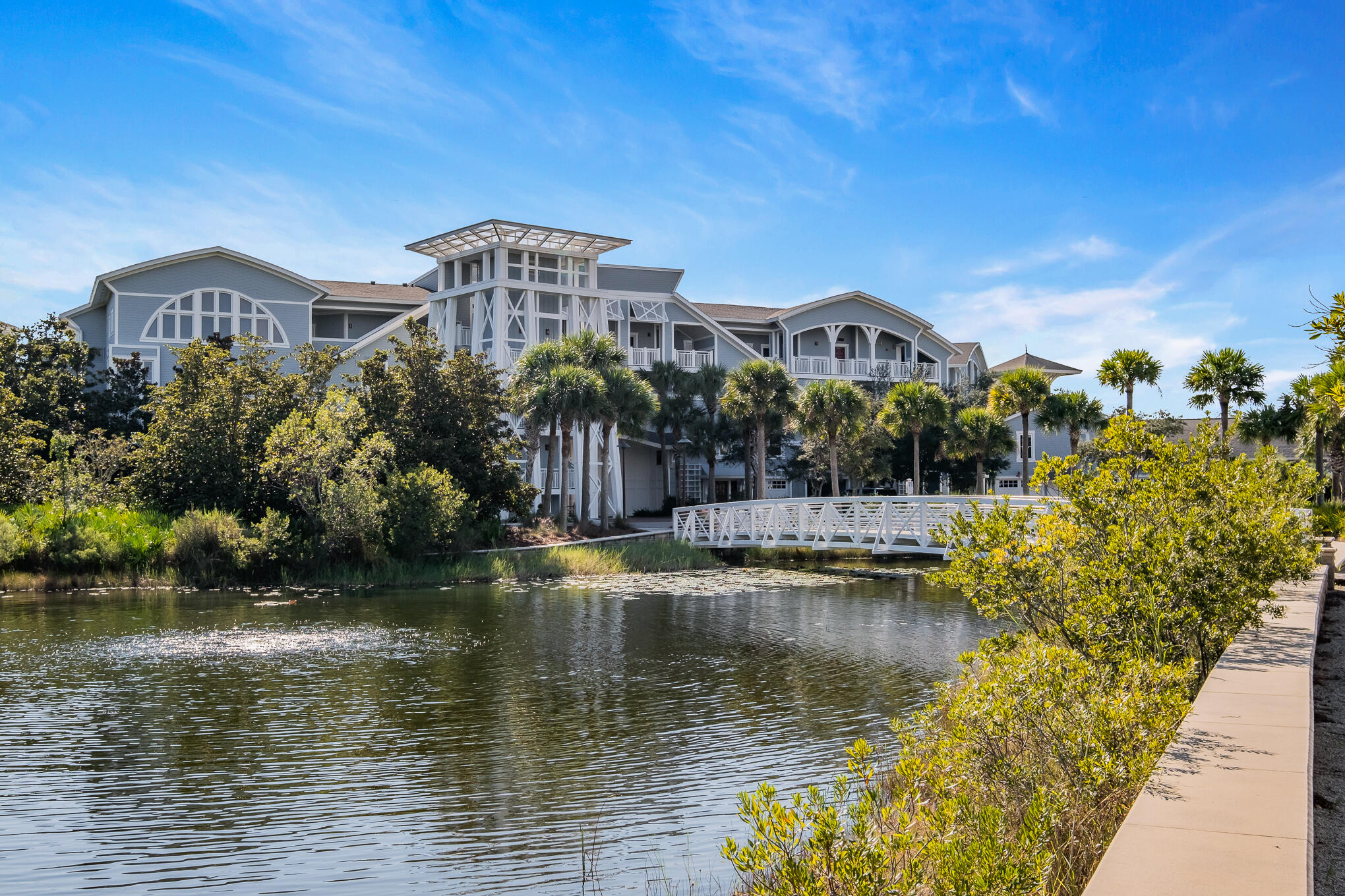 337 Bridge Lane, Unit 103B Inlet Beach, FL 32461 - Photo 30 of 37 a view of a lake with a building in the background