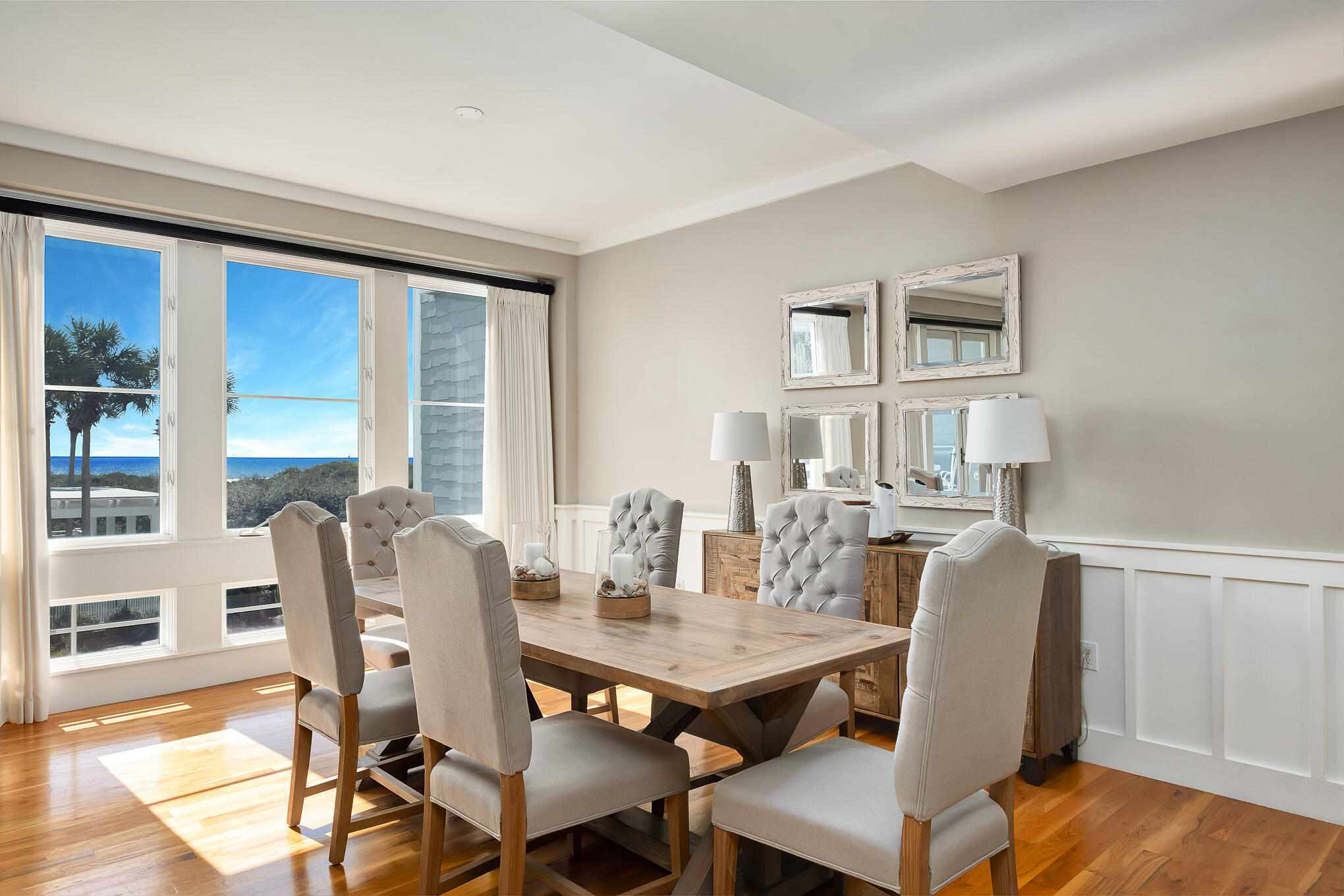 337 Bridge Lane, Unit 103B Inlet Beach, FL 32461 - Photo 4 of 37 a view of a dining room with furniture and wooden floor